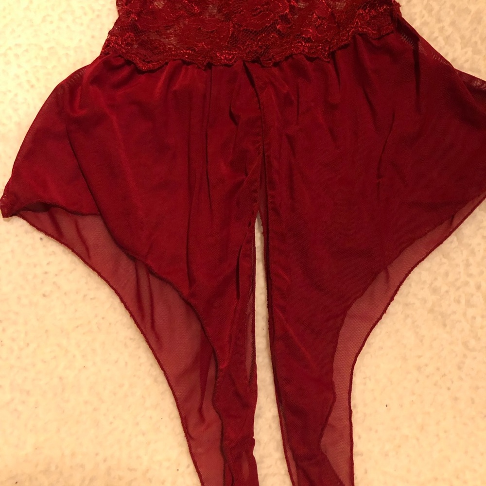 Red, seductive, one-piece lingerie.